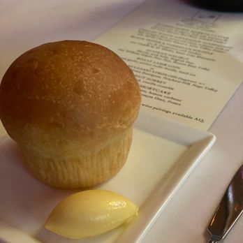 Plumed Horse - Parker House Roll with cultured butter - French Near Me - Saratoga, California Plumed Horse - Parker House Roll with cultured butter - French Near Me - Saratoga, California