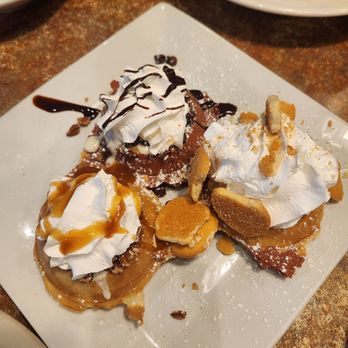 The Diner - mini waffle flights. Cinnamon roll (bottom left), Red velvet (top center), Banana pudding (bottom right) - American Near Me - Tyler, Texas The Diner - mini waffle flights. Cinnamon roll (bottom left), Red velvet (top center), Banana pudding (bottom right) - American Near Me - Tyler, Texas