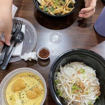 Native Noodles - Curry Laksa Noodles (Soup version) and a stir fried noodle - Singaporean Near Me - New York, New York Native Noodles - Curry Laksa Noodles (Soup version) and a stir fried noodle - Singaporean Near Me - New York, New York