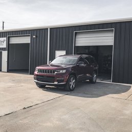 Exterior outside entrance of Top Shelf Tint - 2022 Grand Cherokee with Ceramic XR by Top Shelf Tint in Bentonville - Bentonville, Arkansas Exterior outside entrance of Top Shelf Tint - 2022 Grand Cherokee with Ceramic XR by Top Shelf Tint in Bentonville - Bentonville, Arkansas