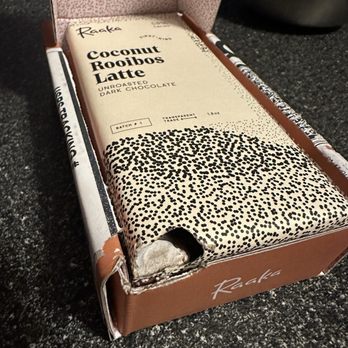 Raaka Chocolate - Bars inside of box that were also chewed into by the rodent at Raaka - Chocolatiers & Shops Near Me - Brooklyn, New York