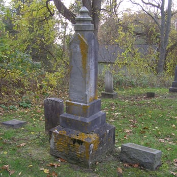 Parshallville Cemetery - Personal pic- a moss covered memorial headstone. - Funeral Services & Cemeteries Near Me - Fenton, Michigan