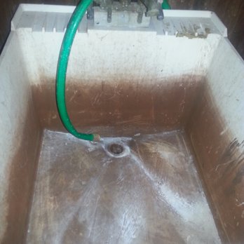 Star Property Management - Basement upon moving in (2016) - sink next to washer and dryer - Property Management Near Me - Baltimore, Maryland
