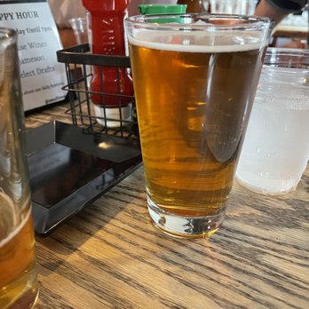 Smaltimore - a glass of beer on a table - Sushi Bars Near Me - Baltimore, Maryland