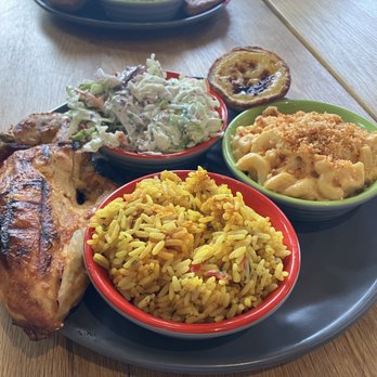 Nando's Peri-Peri - The Yelp complimentary meal: 1/4 breast, rice, coleslaw, the new mac and cheese, and the Portuguese tart. - Portuguese Near Me - Richmond Hill, Ontario Nando's Peri-Peri - The Yelp complimentary meal: 1/4 breast, rice, coleslaw, the new mac and cheese, and the Portuguese tart. - Portuguese Near Me - Richmond Hill, Ontario