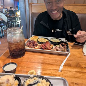 Famous Dave's Bar-B-Que - my ice tea in a mason jar and his food he ordered which was brisket,chopped pork, potato salad, Mac and cheese and corn bread. - Barbeque Near Me - San Jose, California Famous Dave's Bar-B-Que - my ice tea in a mason jar and his food he ordered which was brisket,chopped pork, potato salad, Mac and cheese and corn bread. - Barbeque Near Me - San Jose, California