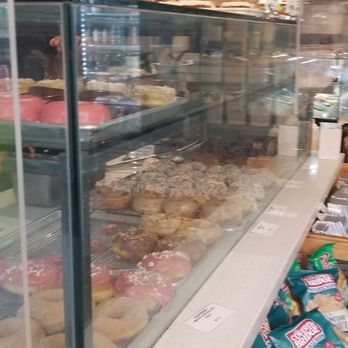 The Donuterie - a display of donuts in a bakery - Donuts Near Me - Toronto, Ontario The Donuterie - a display of donuts in a bakery - Donuts Near Me - Toronto, Ontario