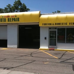 Sunny Day Auto Repair - Near the blue walkway over the road on Cedar.