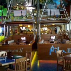 Volcano Bar - Loved it! Looks like a tropical paradise. Right down to two fishing boat dining booths!