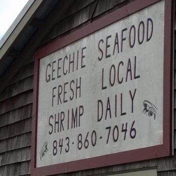 Geechie Seafood - a sign on the side of a building - Seafood Markets Near Me - Mount Pleasant, South Carolina Geechie Seafood - a sign on the side of a building - Seafood Markets Near Me - Mount Pleasant, South Carolina