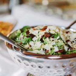 Mixed Greens with roasted grape tomatoes, red chili spiced nuts, marinated jicama, shaved manchego, with red pepper vinaigrette.