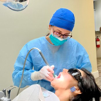 Gemini Dental - Amazing doctor doing the cleaning very deep - Cosmetic Dentists Near Me - Doral, Florida