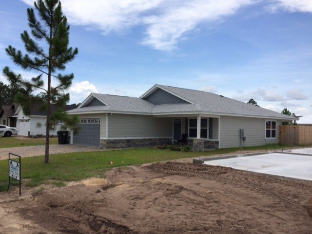 Slide of Greg's Roofing Of Bay County