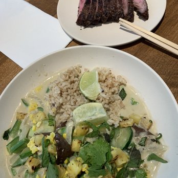 Flower Child - Spicy Coconut Curry with Organic Brown Rice and Steak*.... steak is served medium - Salad Near Me - Charlotte, North Carolina Flower Child - Spicy Coconut Curry with Organic Brown Rice and Steak*.... steak is served medium - Salad Near Me - Charlotte, North Carolina