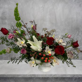 Boulevard Florist - Orchids! Cymbidium orchids arranged with premium blooms in a modern design. - Florists Near Me - Center Moriches, New York Boulevard Florist - Orchids! Cymbidium orchids arranged with premium blooms in a modern design. - Florists Near Me - Center Moriches, New York