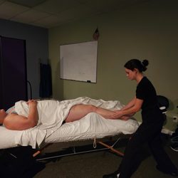 Body In Mind Massage Institute - Our newest Toms River night class - graduating June 2023 - practices their hands-on skills.
