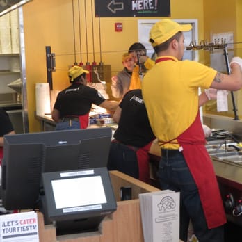 District Taco - kitchen at non stop work during rush hour - Mexican Near Me - Vienna, Virginia District Taco - kitchen at non stop work during rush hour - Mexican Near Me - Vienna, Virginia