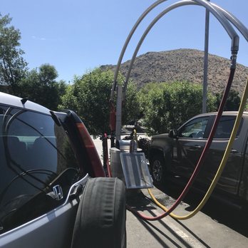 Sierra Express Car Wash - Vacuum hoses on both sides of the car - Car Wash Near Me - Reno, Nevada