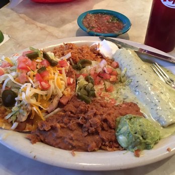 Chuy's - combo of chicken enchilada/tomatillo sauce and chicken chalupa. good. - Tex-Mex Near Me - Fort Worth, Texas