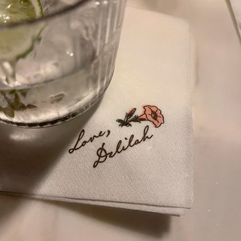 Delilah - Vodka soda on Delilah napkin - New American Near Me - Las Vegas, Nevada Delilah - Vodka soda on Delilah napkin - New American Near Me - Las Vegas, Nevada