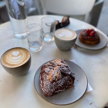 La Cabra - Double baked almond croissant with cappuccino - Bakeries Near Me - New York, New York