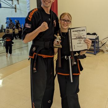 MX Martial Arts - Coach Gabe and my daughter Coach Ashley at her black belt recommended graduation. - Martial Arts Near Me - Chandler, Arizona MX Martial Arts - Coach Gabe and my daughter Coach Ashley at her black belt recommended graduation. - Martial Arts Near Me - Chandler, Arizona