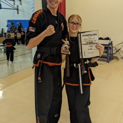 MX Martial Arts - Coach Gabe and my daughter Coach Ashley at her black belt recommended graduation.