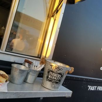 Holy Cow Grill - a hot dog and a bucket of fries - Food Trucks Near Me Holy Cow Grill - a hot dog and a bucket of fries - Food Trucks Near Me