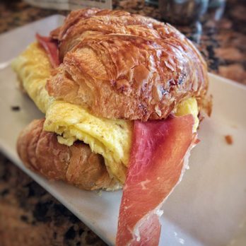 Saquella Cafe - Egg, Meat & Cheese Croissant / 5.99 One-Egg Omelet, Prosciutto Di Parma, Shaved Asiago - Breakfast & Brunch Near Me - Boca Raton, Florida