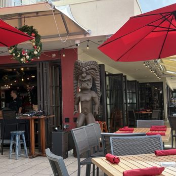 Tikis Grill & Bar - Outside dining looking inwards. - Seafood Near Me - Honolulu, Hawaii