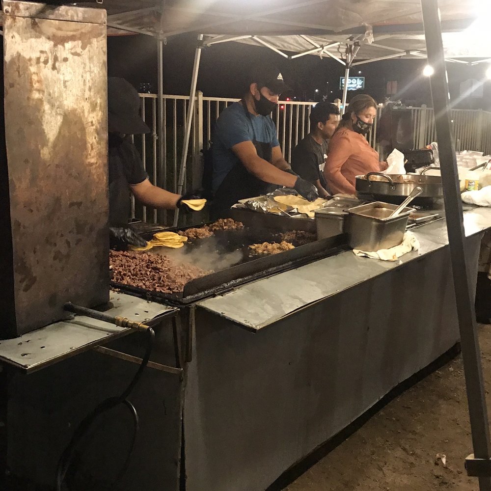  a group of people preparing food