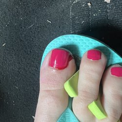 Happy Nail Spa - Bleeding from the tech trying to fix the cuticle she had originally painted over.