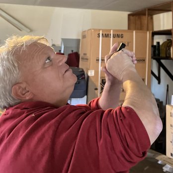 Service Contractors Roofing - a man in a garage - General Contractors Near Me Service Contractors Roofing - a man in a garage - General Contractors Near Me