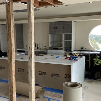 Diaz Hauling - Demo of a 14'x5' island + 8' countertop with TONS of glue underneath - Junk Removal & Hauling Near Me