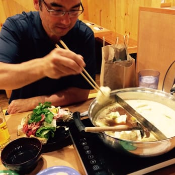 Nabeya Maido - Henry R. performing the cooking duties! :) One must know which ingredients go into the hot pot first, middle, & last! .) - Japanese Near Me - Honolulu, Hawaii Nabeya Maido - Henry R. performing the cooking duties! :) One must know which ingredients go into the hot pot first, middle, & last! .) - Japanese Near Me - Honolulu, Hawaii