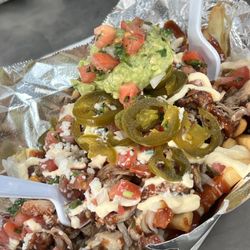 Lunchbox Hippies - BBQ Carnitas loaded fries with added Guacamole