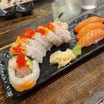 Momo Sushi - a plate of sushi on a table - Sushi Bars Near Me - Vancouver, British Columbia Momo Sushi - a plate of sushi on a table - Sushi Bars Near Me - Vancouver, British Columbia