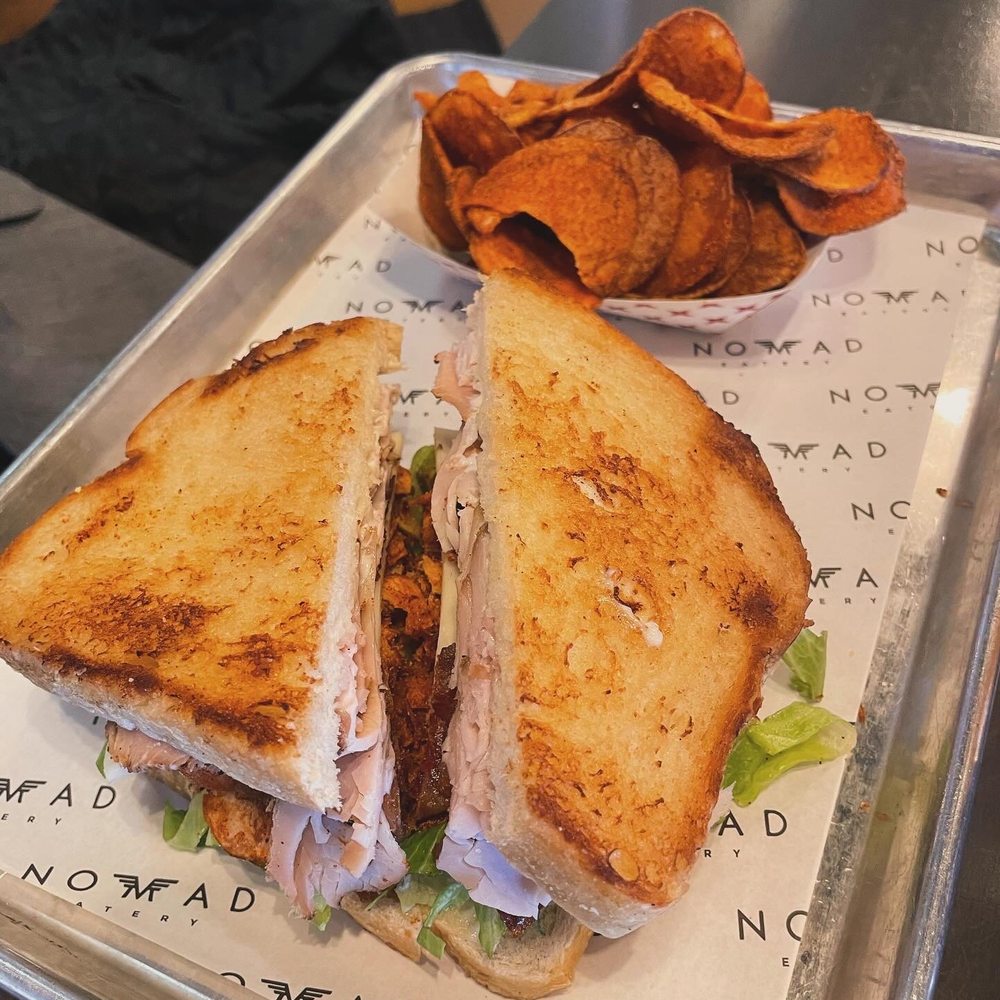 Nomad Eatery - Turkey club with homemade bbq chips - New American Near Me - South Jordan, Utah Nomad Eatery - Turkey club with homemade bbq chips - New American Near Me - South Jordan, Utah