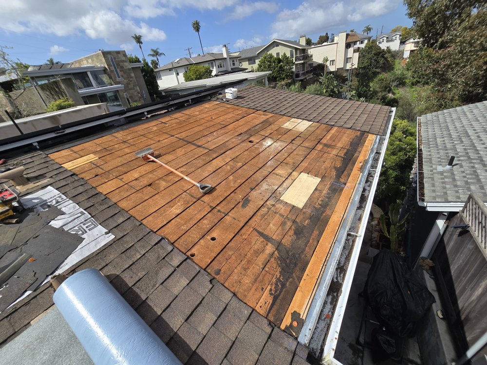 Slide of J&E Roofing Services