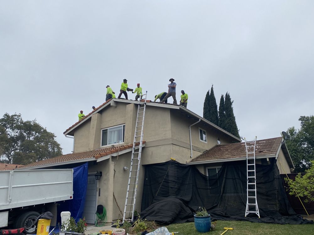 Slide of Troy Roofing & Roof Removal