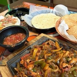 Chicken Fajitas. Cheese dip, salsa and chips