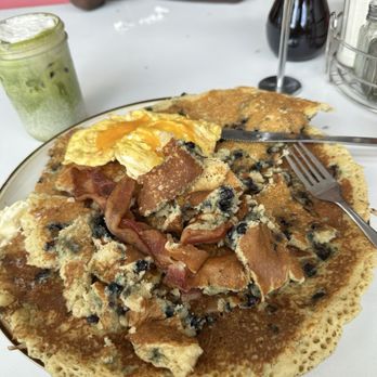 Succotash - Big blueberry pancakes with bacons and side of cheese eggs - Breakfast & Brunch Near Me - Kansas City, Missouri Succotash - Big blueberry pancakes with bacons and side of cheese eggs - Breakfast & Brunch Near Me - Kansas City, Missouri