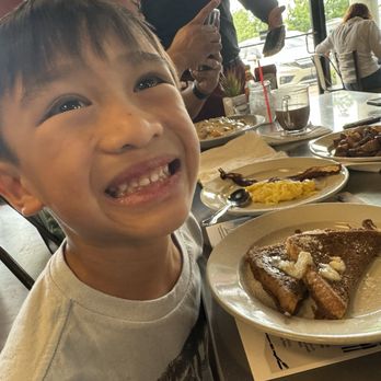 Jamie's Cafe - Our son enjoying his kids French toast with bacon and egg. - Cafes Near Me - Elk Grove, California Jamie's Cafe - Our son enjoying his kids French toast with bacon and egg. - Cafes Near Me - Elk Grove, California