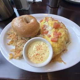 Shrimp omelet with hollandaise sauce.