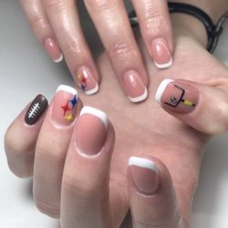 Mystic Nail Collective - French tip with hand painted Steelers theme! Check out the field goal and tiny foootball!!!
