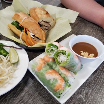 Pho Craze - Spring rolls (front) and banh mi (back) - Vietnamese Near Me - Pinole, California Pho Craze - Spring rolls (front) and banh mi (back) - Vietnamese Near Me - Pinole, California
