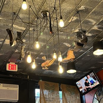 Shoe’s Cup and Cork - The shoe chandelier - New American Near Me - Leesburg, Virginia Shoe’s Cup and Cork - The shoe chandelier - New American Near Me - Leesburg, Virginia