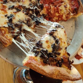 Blue Line Pizza - Half Chicago chop, half mushroom truffle - Pizza Near Me - Mountain View, California Blue Line Pizza - Half Chicago chop, half mushroom truffle - Pizza Near Me - Mountain View, California