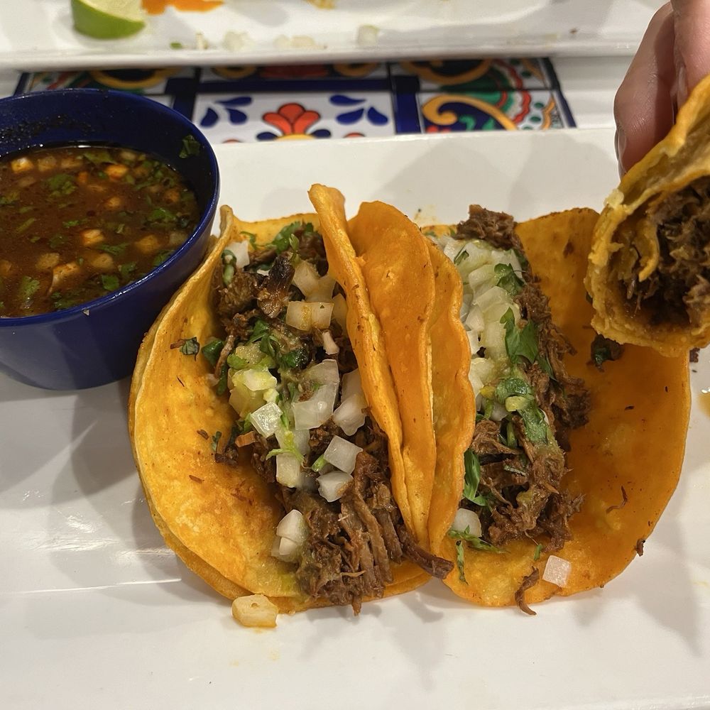 Birria tacos with consommé Birria tacos with consommé