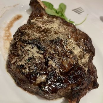 The Capital Grille - Bone-In Ribeye 22oz cooked and seasoned to perfection - Steakhouses Near Me - San Antonio, Texas